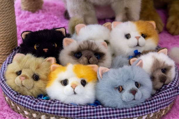 Funny toy kittens in a basket. High quality photo