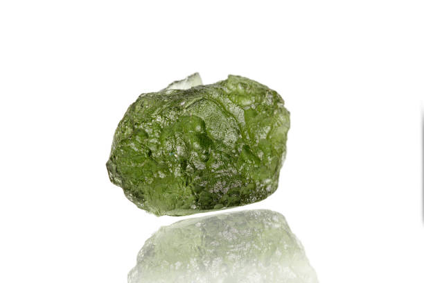 istock macro stone mineral Moldavite on a white background 1327072392