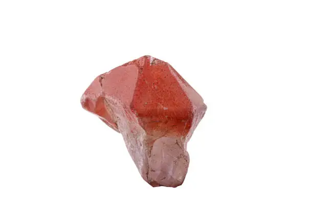 macro mineral stone quartz pink on a white background close up