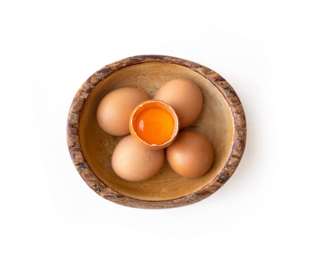 istock Fresh raw egg yolk. Cooking food ingredient isolated on white background. 1327079906