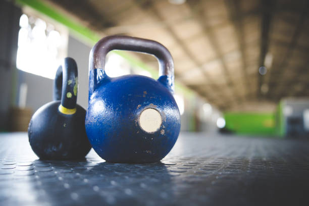 istock Close up image of kettle bell weights in a gym 1327080254