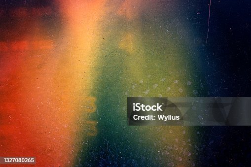 istock Abstract colorful scratched film background 1327080265
