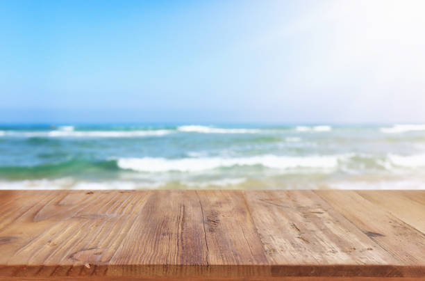 istock wood deck in front of sea landscape. ready for product display 1327080351