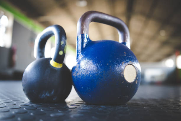 istock Close up image of kettle bell weights in a gym 1327080380
