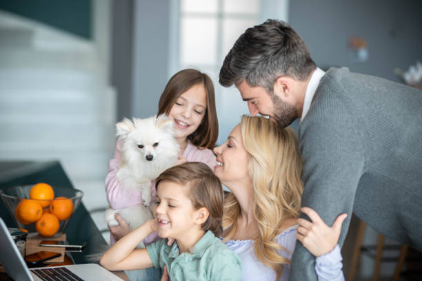istock Family and a dog 1327081762