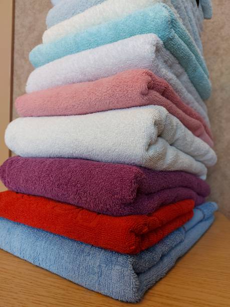 istock Multi-colored cotton terry towels are stacked 1327083213