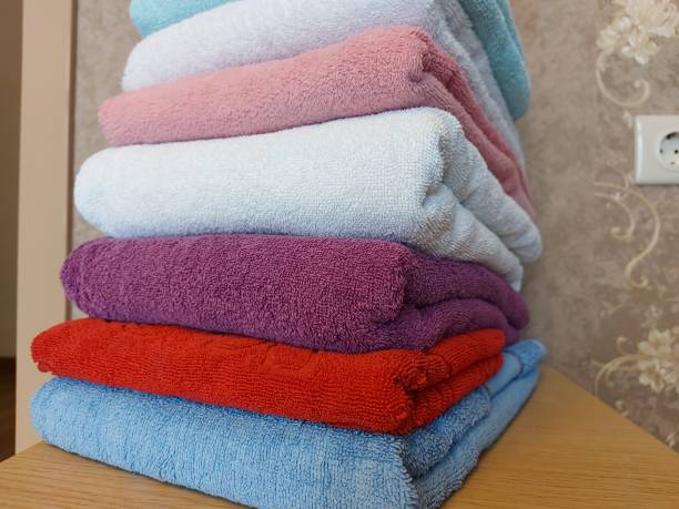 istock Multi-colored cotton terry towels are stacked 1327083261