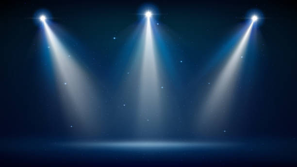 Empty dark blue studio. Smooth blurred gradient background. Abstract empty illuminated room. Backdrop for displaying products. Vector illustration Spotlight backdrop. Illuminated blue stage. Background for displaying products. Bright beams of spotlights, shimmering glittering particles, a spot of light. Vector illustration stage light stock illustrations