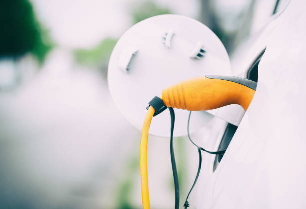 istock Electric Car Charging At Power Station 1327086546