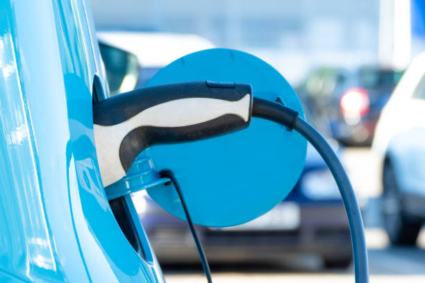 istock Electric Car Charging At Power Station 1327086612