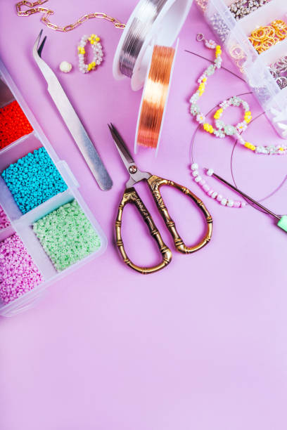 istock Flatlay of seed beads with tools for making jewelry 1327087599