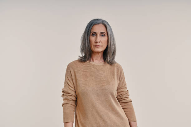 istock Mature beautiful woman looking at camera 1327087787