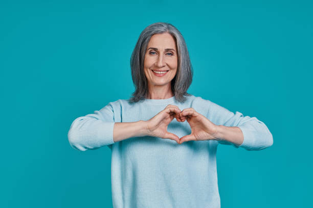 istock Mature beautiful woman looking at camera and smiling 1327089300