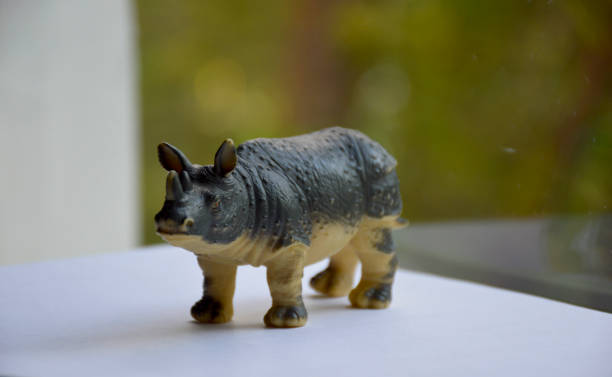 istock small yellow gray rhino toy 1327092429