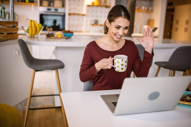 istock Young woman working from home 1327095650