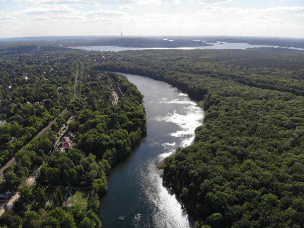Aerial view of Schlachtensee, the most southerly in the Grunewald chain of lakes, which belongs geologically to the Teltow plateau Aerial view of Schlachtensee, the most southerly in the Grunewald chain of lakes, which belongs geologically to the Teltow plateau grunewald berlin stock pictures, royalty-free photos & images