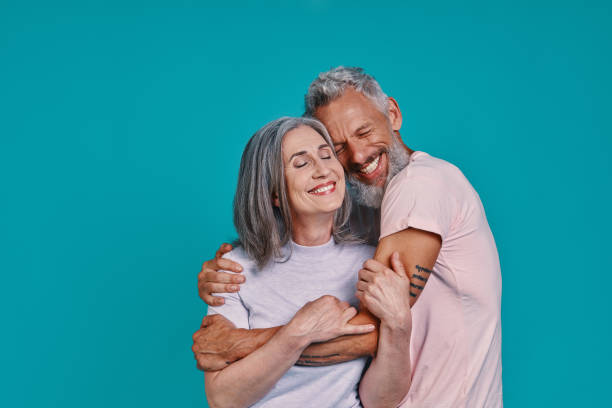 istock Loving senior couple bonding and smiling 1327098232