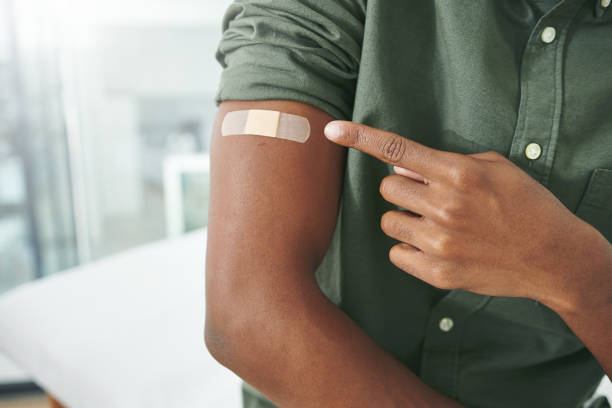 istock Shot of an unrecognizable person's arm with a band-aid 1327098790