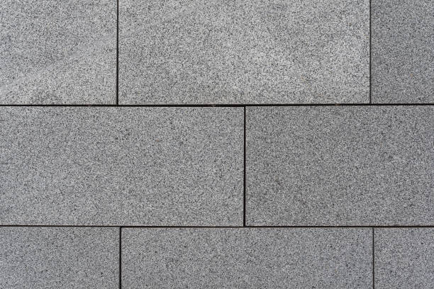 istock Gray paving slabs with seams 1327105034