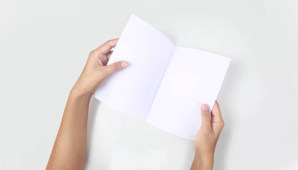 istock Hands holding paper blank for  letter paper 1327105547