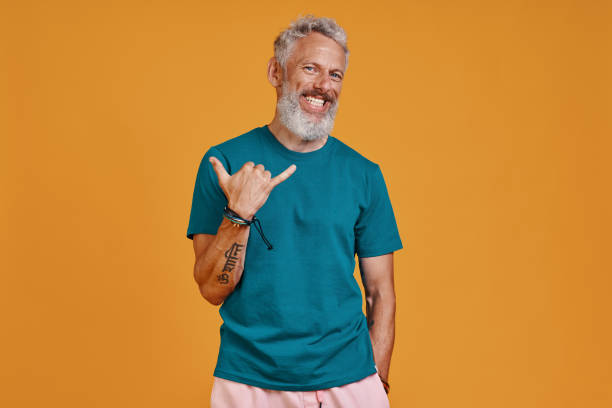 istock Happy senior man gesturing and smiling 1327105604