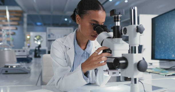 istock Shot of a young scientist using a microscope in a laboratory 1327109867