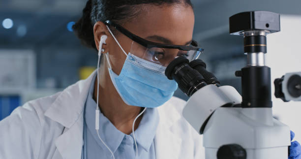 istock Closeup shot of a young scientist using a microscope in a laboratory 1327110650