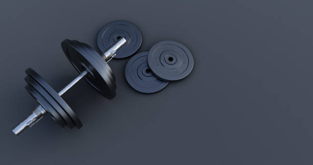 istock 3d render of Stylish Iron Barbell, dumbbell isolated on black background. High resolution, Gym equipment, 1327110856