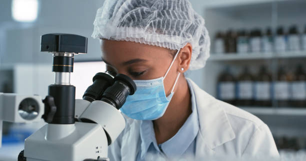 istock Closeup shot of a young scientist using a microscope in a laboratory 1327112217