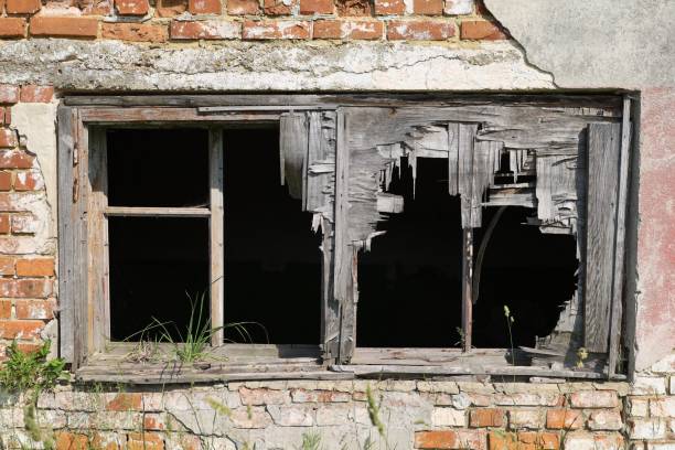 istock Old wall with windows in an abandoned room. 1327114736