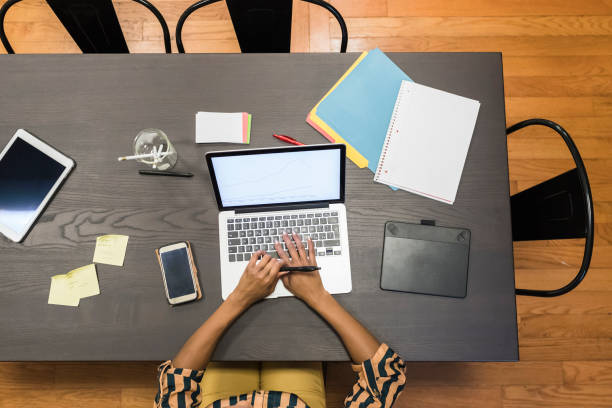 istock Businesswoman working at office with laptop 1327118611
