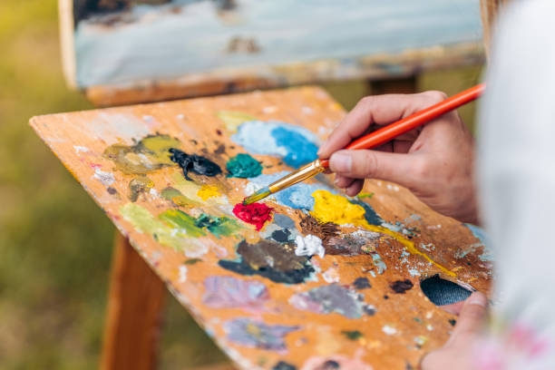 istock Wooden palette with paint on it 1327119263