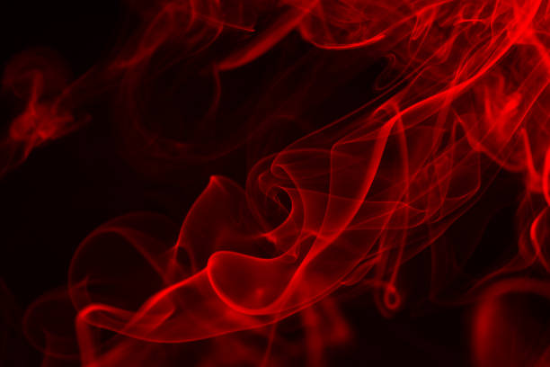 istock Colorful smoke close-up on a black background 1327119699