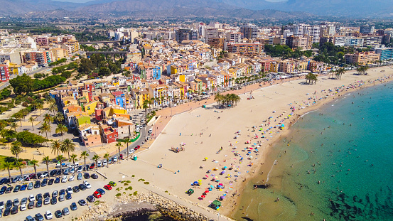 Villajoyosa beach from the air overhead view with its colorful traditional facades in Spain, the Costa Blanca of Alicante