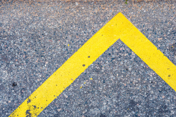 istock Old asphalt on the road. Yellow line. 1327121567