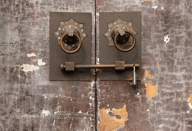 istock Traditional Chinese bronze handle on brown door. Oriental architecture background 1327122509