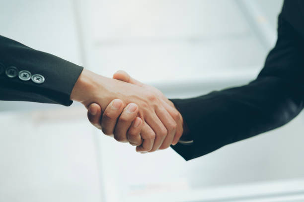 istock Businessmans handshake after good deal. 1327128838