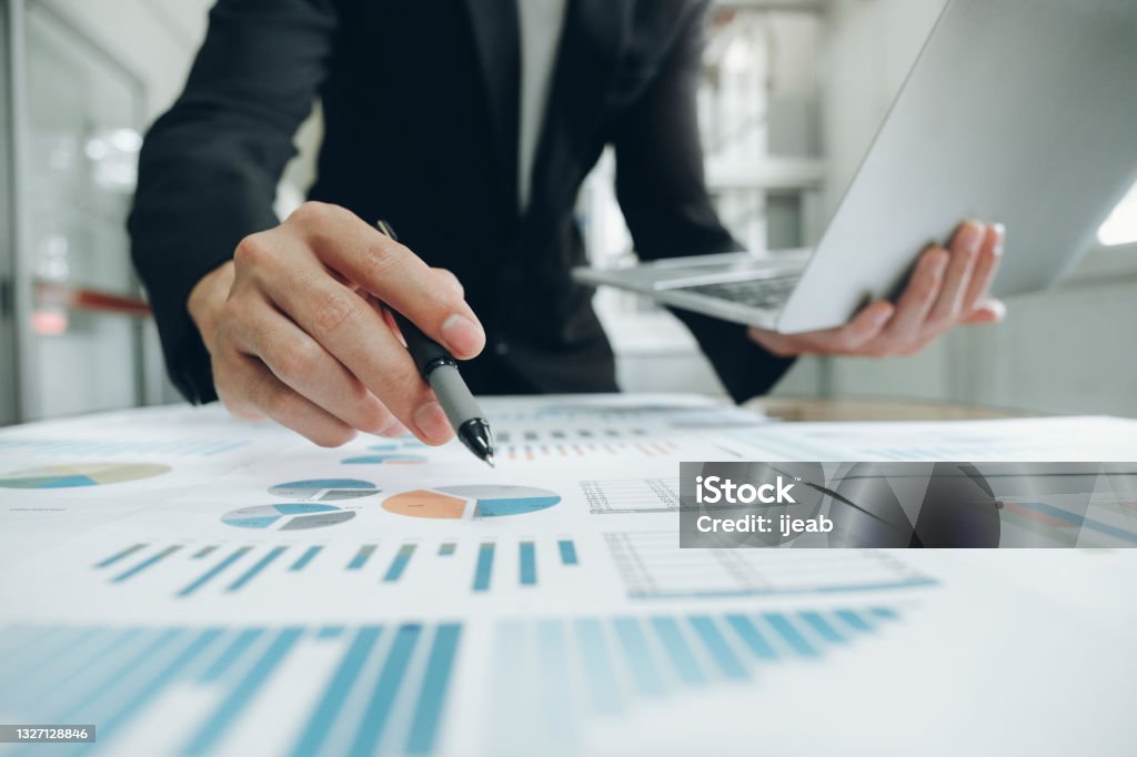 Businessman analyse investment marketing data. Businessman planning and analyse investment marketing data. Finance Stock Photo
