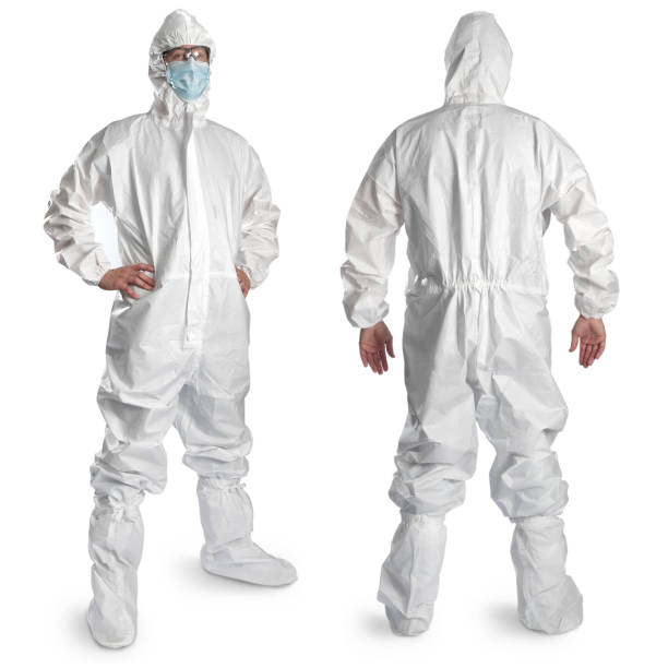 istock Man in white isolation suit on white background 1327129121