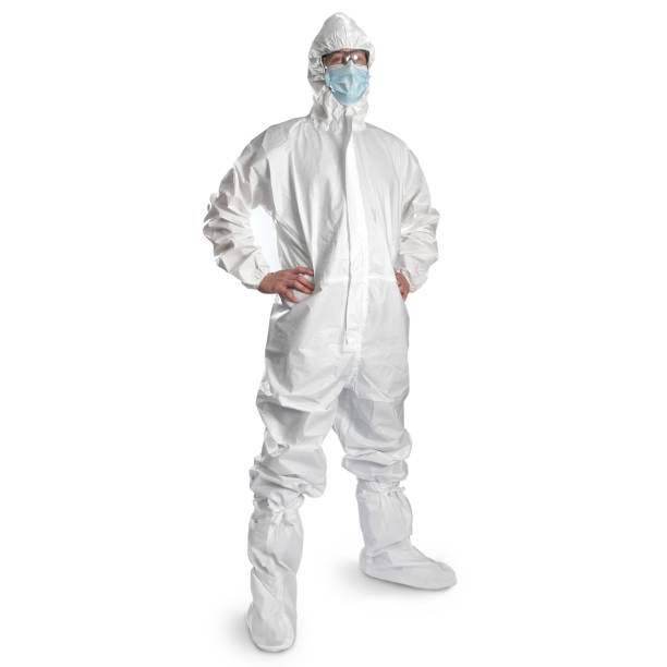 istock Man in white isolation suit on white background 1327129132
