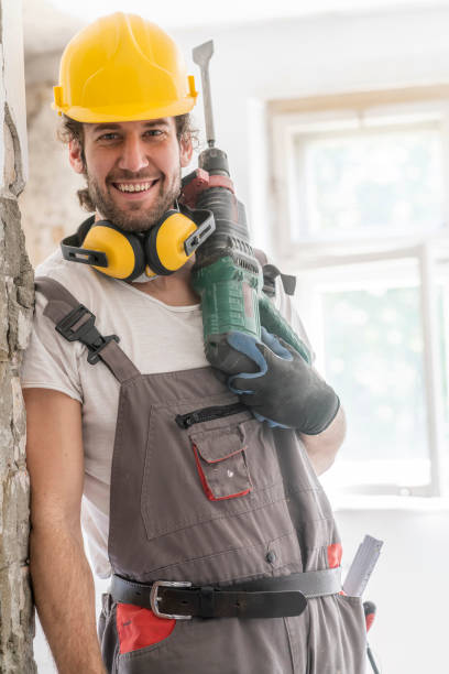 worker using hammer drill - home improvement work tool hammer portrait imagens e fotografias de stock