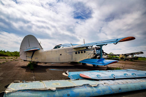 istock Abandoned planes old an-2 in the open air. 1327135735