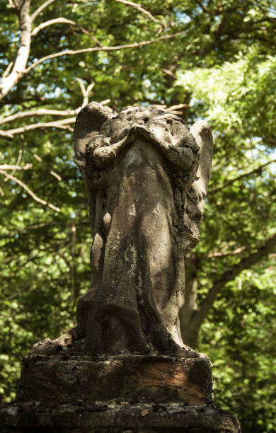 istock A headless angel in a cemetery 1327140222