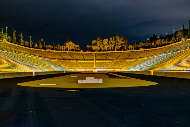 Night scene empty olympic stadium, athens city, greece