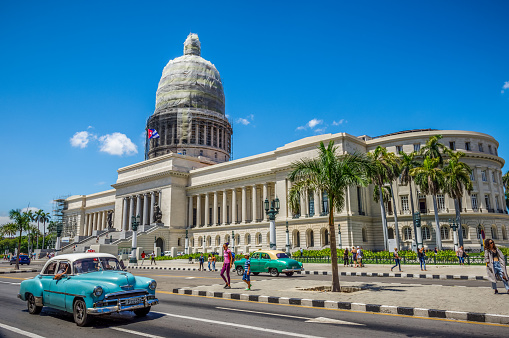 July 31, 2018 - La Havana, Cuba: blue old american classic car taxi in Havana in front of Capitolio