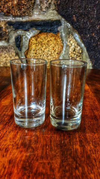 istock Bistro glasses on wooden table 1327150475