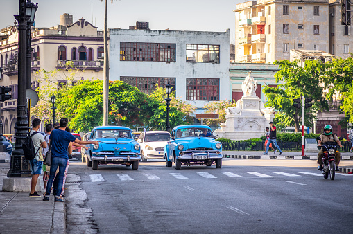 August 1, 2018 - La Havana, Cuba: tourists calling a taxi in La Havana