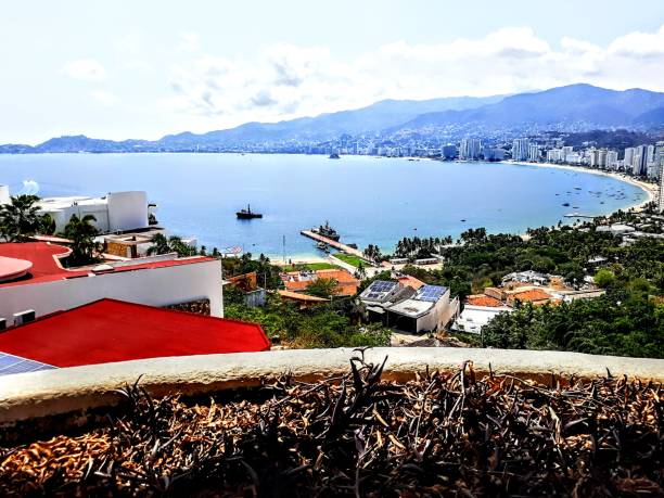 istock Acapulco skyline summer sky cityscape and mountains 1327153214