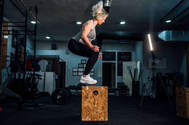 istock Sports woman doing box squat 1327155617