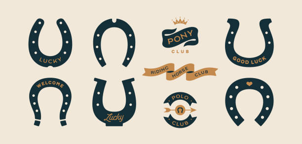 Lucky horseshoe. Set of horseshoes Lucky horseshoe. Set of horseshoes, graphic and lucky symbols. Design elements, set drawing, vintage hipster style. Horseshoe, typography, ribbon and good luck fortune sign. Vector Illustration good luck charm stock illustrations